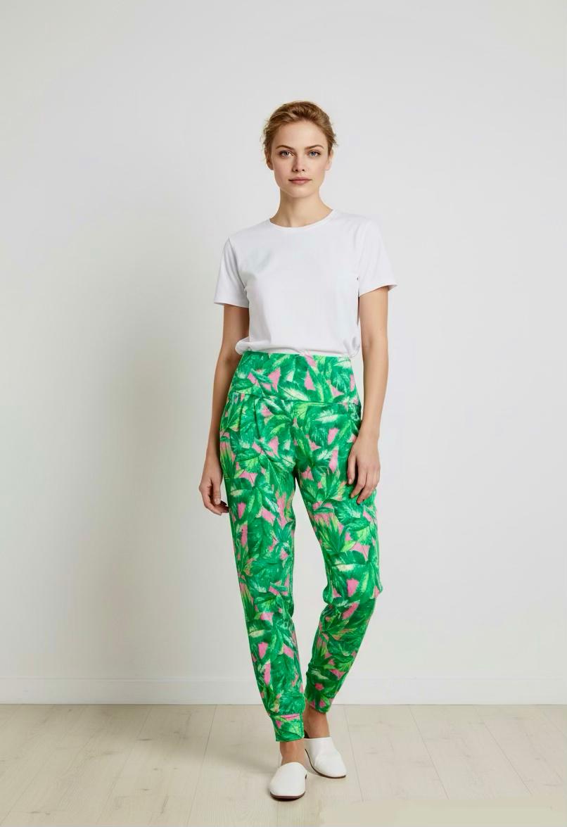 Front view of Jungle Candy jogger pants in pink with leafy print – Just Jacksy