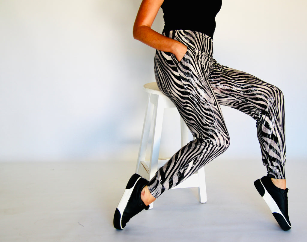 Front view of Silver Zebra jogger pants in silver-grey and black zebra print – Just Jacksy